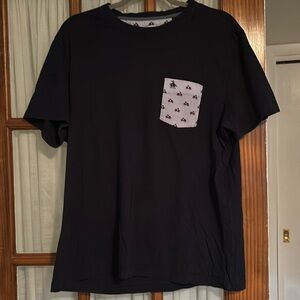 Men’s navy tee with penguin pocket